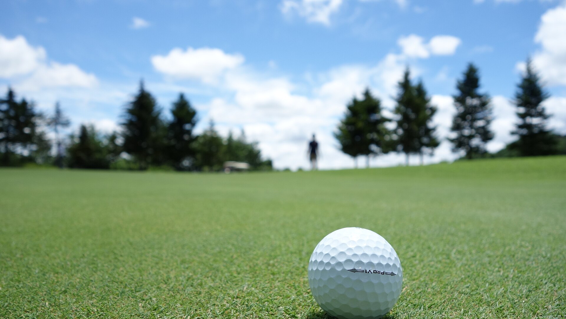 Golf ball sitting on a putting green